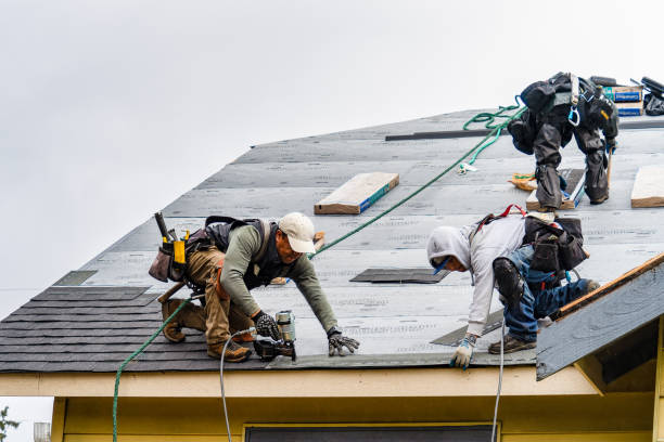 Professional Roofing technician working in Iron Station, NC